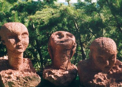 Tenors tree heads looking up down and straight outdoor sculpture